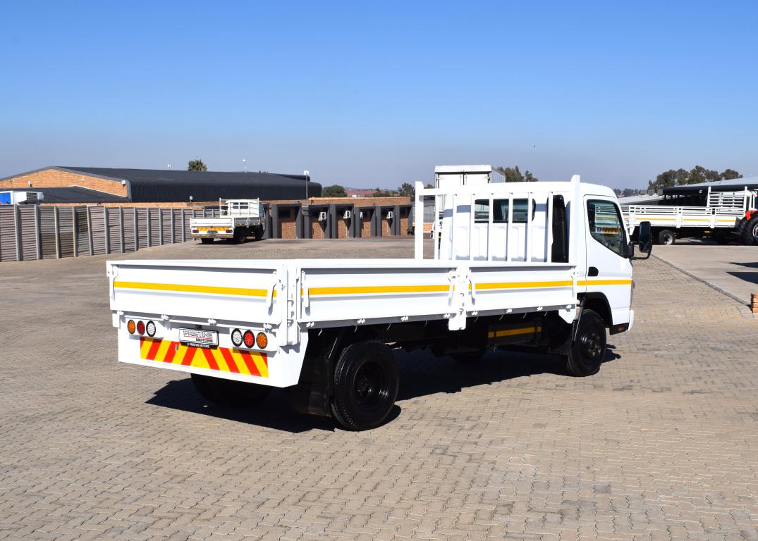 2008 Fuso Canter FE7-136 Dropside Truck