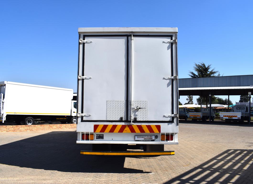 2012 Nissan UD 90 Volume Body Truck