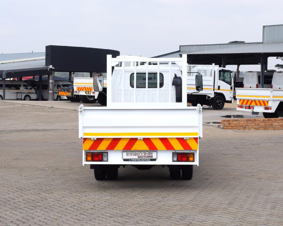 2006 Isuzu NHR 150 Dropside Driving School Truck